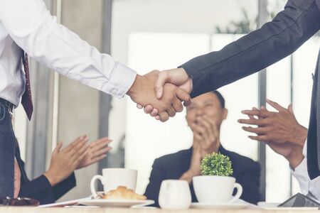 Effectively Business team conference meeting. Partnership group of people building successful teamwork. Team work Concept.の写真素材