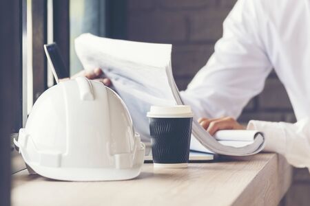 Smart engineer working outdoor at the coffee shop.の写真素材