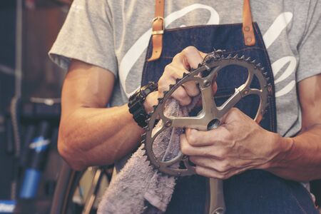 Mechanic Car Service in automotive garage auto car center and vehicles service mechanical engineering. Technician mechanic hands car repairs workshop service center. Services car engine machine.の写真素材