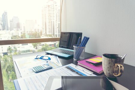 Excel graph with Spreadsheet Document showing Information Financial Startup Concept. Financial Planning making Accounting Database Report. Graphs and chart on screen with stationery set business stuffの写真素材