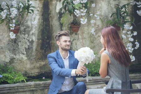 will you marry me ? yes I do. white wedding  bouquet proposalの写真素材
