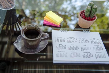 2020 calendar desk planner agenda plan on schedule event. Timetable agenda by organizer schedule. Calendar event plan concept.の写真素材