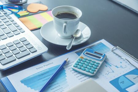 Excel graph with Spreadsheet Document showing Information Financial Startup Concept. Financial Planning making Accounting Database Report. Graphs and chart on screen with stationery set business stuffの写真素材