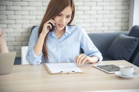 Work from home banner woman working on laptop outdoor at home cause of corona covid-19 virus world pandemic infection. Beautiful women connect internet outdoor working wireless internet technologyの写真素材