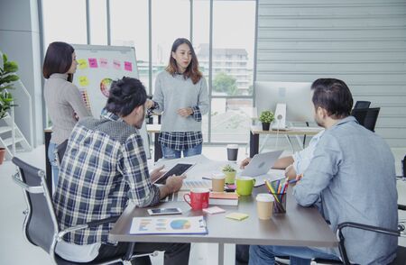 Asian Teamwork Collaboration Team Meeting Communication concept with Business people Working Together in Conference Room. Diversity Partner Business Meeting brainstorming togeter Businessman and Teamの写真素材