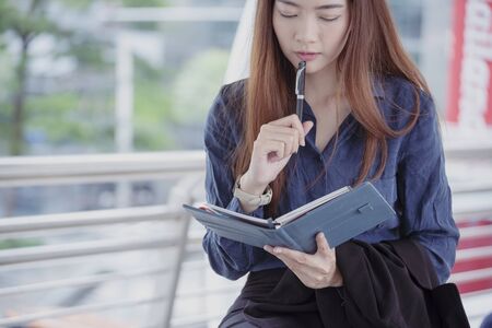 Agenda of planner woman schedule and organize appointment 2019 Calendar Event. Smart Business woman note and schedule to set timetable organize schedule. Woman hands writing on Agenda.Timeline conceptの写真素材
