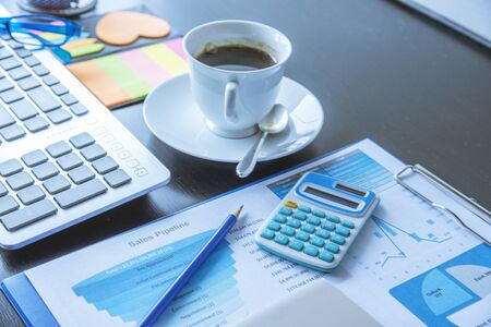 Excel graph with Spreadsheet Document showing Information Financial Startup Concept. Financial Planning making Accounting Database Report. Graphs and chart on screen with stationery set business stuffの写真素材