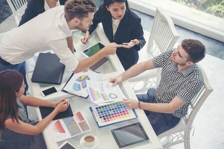Multi Ethnics Teamwork Collaboration Team Meeting Communication concept in Business people Working Together Conference Room. Diversity Partner Business Meeting brainstorming together Businessman Teamの写真素材