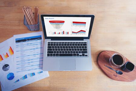 Excel graph with Spreadsheet Document showing Information Financial Startup Concept. Financial Planning making Accounting Database Report. Graphs and chart on screen with stationery set business stuffの写真素材