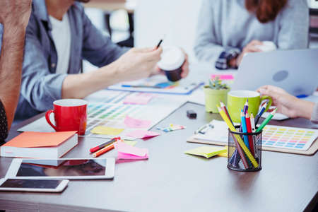 Diversity Creative Design Collaboration Team Meeting Communication with Business Partners Teamwork Working Together in Conference Room. Group of young people Meeting Trust in Businessman and Team.の写真素材