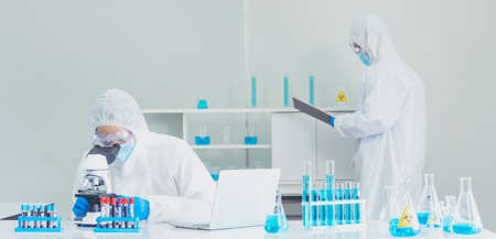 Scientist covid-19 virus chemistry  research experiment biotech antibody sample laboratory cultivate...