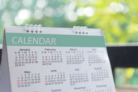 2019 Calendar Event Planner. Close up on calendar on desk with bokeh and sun light as a background with copy space. Schedule using calendar set timetable on organize schedule. Timeline Concept.の写真素材