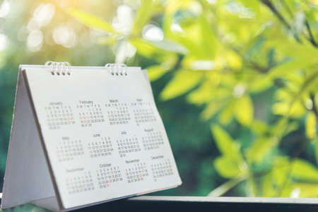 2019 Calendar Event Planner. Close up on calendar on desk with bokeh and sun light as a background with copy space. Schedule using calendar set timetable on organize schedule. Timeline Concept.の写真素材
