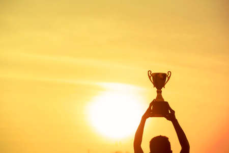 Sport Silhouette trophy best man Winner Award victory trophy for professional challenge. Golden Trophy cup champion contest win sport award reward prize. Win-Win Sport Challengeの写真素材