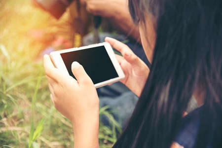 Smart girl using internet to searching for homework.の写真素材