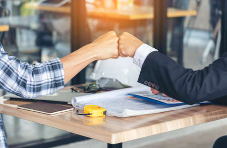 Partner Business Trust Teamwork Partnership. Industry contractor fist bump dealing mission business. Mission team meeting group of People Fist bump Hands together. Business industry trust teamworkの写真素材