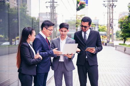 Group diversity partner business meeting trust in businessman and tam talking together modern city asian Teamwork Collaboration Team Meeting Communication concept with Business people Working Togetherの写真素材
