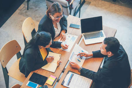 Multi Ethnics Teamwork Collaboration Team Meeting Communication concept in Business people Working Together Conference Room. Diversity Partner Business Meeting brainstorming together Businessman Teamの写真素材