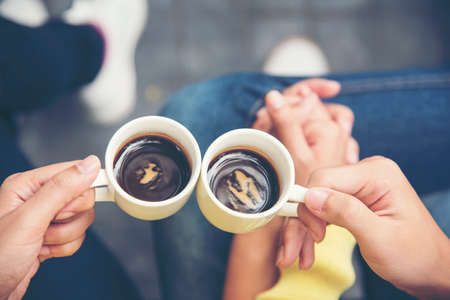 coffee lover concept. Close up woman hands holding cup of coffee. Drinking coffee make people fresh and more concentrate on job. winter need hot drinking coffee is the best choice.の写真素材