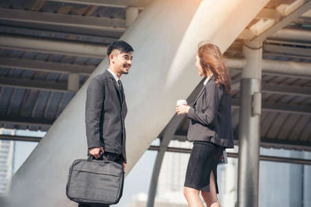 Business partners meet up outside the office. city view is a background. business concept.の写真素材