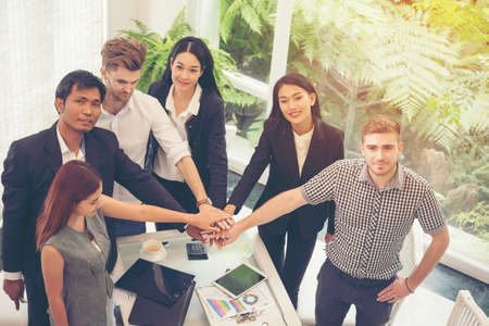 Business Partners Trust in Team with hands together to Greeting Start up project Contractor....