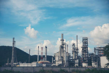 Oil refinery gas petrol plant industry with crude tank, gasoline supply and chemical factory. Petroleum barrel fuel heavy industry oil refinery manufacturing factory plant. Refinery industry conceptの写真素材