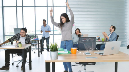 Office teamwork celebration working happiness Happy business people dance expression together at office after job done complete in meeting room. Diversity people happy moment dance together in companyの写真素材