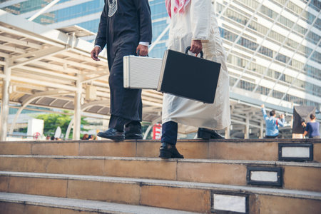 Crowd business people walking go to work in modern city life to working office. Crowd worker group of people busy life with businesswoman,  man in urban street city lifestyle. Business People Concept.の写真素材