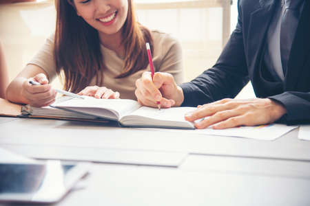 Diversity multiethnic team group of business people Present meeting conference room brainstorming business graph, chart. Multicultural Teamwork collaborate business team meeting together trust partnerの写真素材