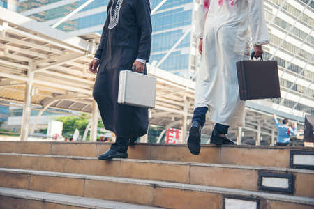 Crowd business people walking go to work in modern city life to working office. Crowd worker group of people busy life with businesswoman,  man in urban street city lifestyle. Business People Concept.の写真素材
