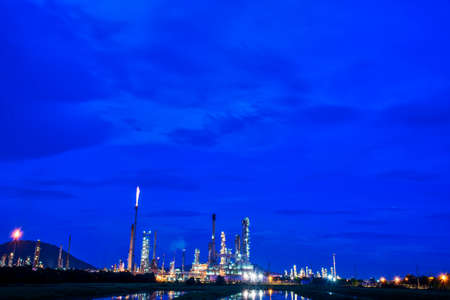 Oil refinery gas petrol plant industry with crude tank, gasoline supply and chemical factory. Petroleum barrel fuel heavy industry oil refinery manufacturing factory plant. Refinery industry conceptの写真素材