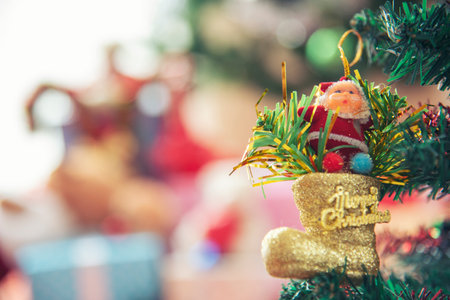 Christmas tree decorated holiday winter xmas celebration present gift to family decorate with ornament golden ball in cozy living room. Merry Christmas and happy new year festival traditional conceptの写真素材