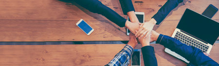 Banner diversity solidarity team multiethnic Partners hands together teamwork. Group of multiracial...