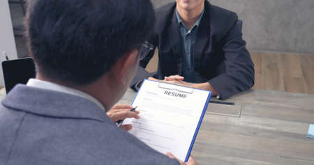 Businessman job interview by human resource HR officer interviwing, talk new employee shaking hands...