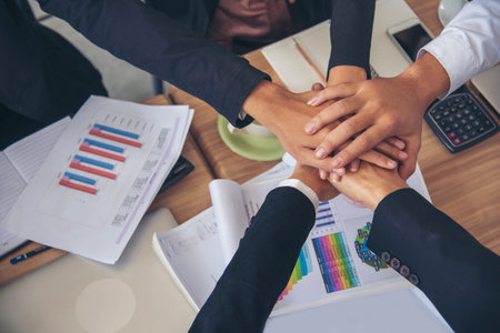 Partners hands together teamwork group of business people meeting in firm company office. Diversity Hands join empower partnership teams connection community. Success Mergers acquisitions partnershipの写真素材
