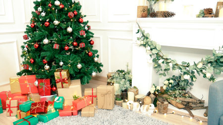 Christmas tree decorated holiday winter xmas celebration present gift to family decorate with ornament golden ball in cozy living room. Merry Christmas and happy new year festival traditional conceptの写真素材