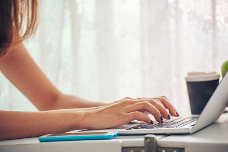 Blogger Woman hands typing laptop keyboard. Close up women hands using laptop social network person....
