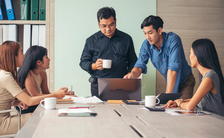 Group of business people meeting in conference room brainstorming consult business document graph chart office desk. Diversity multiethnic group of business people brainstorming and working together.の写真素材
