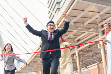Competitive person race to be first place winner. Multiethnic diversity people contest. Business competition group of business people in formal suit run to finish line success goal victory conceptの写真素材