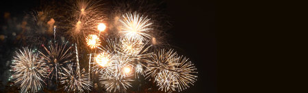 Banner Golden Firework celebrate anniversary happy new year 2023, 4th of july holiday festival. colorful gold firework celebrate national holiday. Banner new year 2023 party time with copy spaceの写真素材
