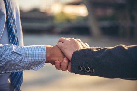 Lawyer partnership Businessman handshake together Notary lawfirm. Two Men Trust honesty business customer handshake promise respect partner. Diversity solidarity team Partner hands together teamworkの写真素材