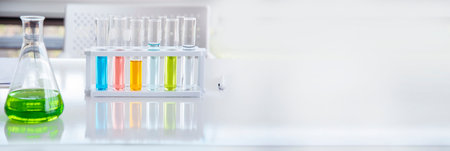 Banner Science chemistry glass tubes object on lab background. Wide Liquid tube biology laboratory chemical fluid scientist object medical glass tubes. Chemistry scientific background with Copy Spaceの写真素材