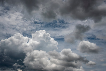 Dramatic dark storm thundercloud rain clouds on black sky background. Dark thunderstorm clouds...