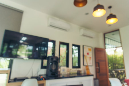 Blurry background interior design bar table chair window decorate indoors space display. Blurred...