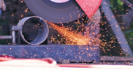 Hot flame welding metal work cutting fire iron workshop. Welding machine iron metal sparking....
