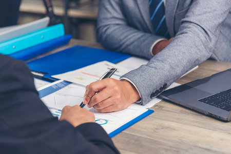 Happiness two businessman working together confident team meeting in office desk. Team business man...
