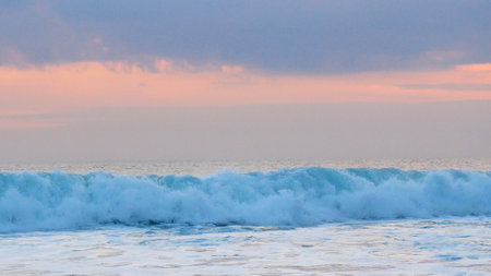 Turquoise ocean sea water white wave splashing deep blue sea. Bird eye view monster wave splash on...