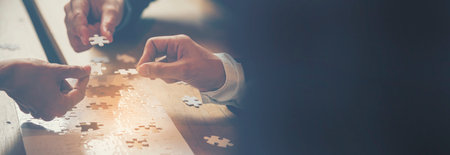 Banner Implement puzzle improve hand holding together solve synergy organize team connection plan trust strategy. Stakeholder business trust teams hands holding jigsaw puzzle synergy with copy spaceの写真素材