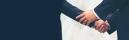 Banner Trust honesty business customer handshake together promise partner. Panorama Businessman teamwork diversity solidarity team Partner hands together. Team meeting shaking hands with copy spaceの写真素材