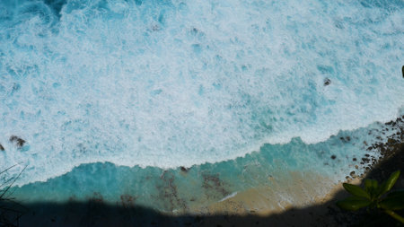Turquoise ocean sea water white wave pattern splashing deep blue sea. Seascape dark ocean background wave splash on rock. Tropical sea beach in summer seaside outdoor. Water Surface blue wave patternの写真素材